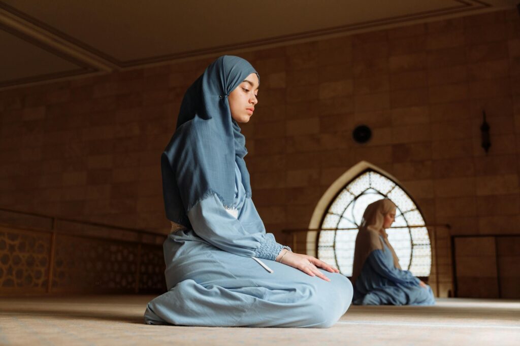 a woman in blue hijab